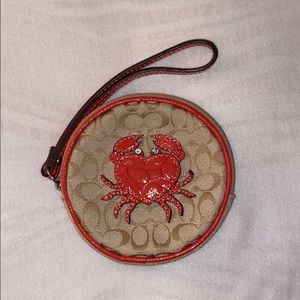 COACH crab wristlet